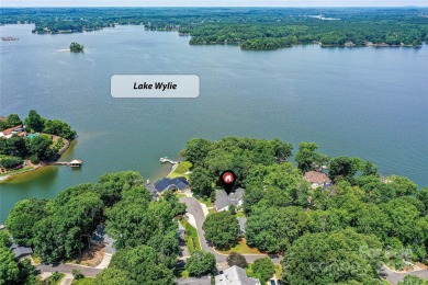 Spectacular Sunsets and Panoramic views of Lake Wylie's main on Tega Cay Golf Club in South Carolina - for sale on GolfHomes.com, golf home, golf lot