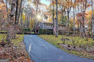 Located in the heart of Sky Valley, welcome to 381 W Sugarbush on Sky Valley Resort and Country Club in Georgia - for sale on GolfHomes.com, golf home, golf lot