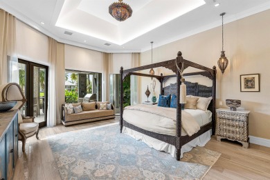 Perched on a rare, oversized lot at the end of a quiet on Boca Delray Golf and Country Club in Florida - for sale on GolfHomes.com, golf home, golf lot