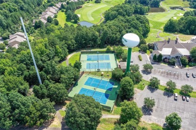 Spectacular Sunsets and Panoramic views of Lake Wylie's main on Tega Cay Golf Club in South Carolina - for sale on GolfHomes.com, golf home, golf lot
