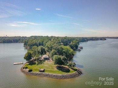 Spectacular Sunsets and Panoramic views of Lake Wylie's main on Tega Cay Golf Club in South Carolina - for sale on GolfHomes.com, golf home, golf lot