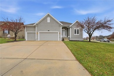This beautifully updated reverse 1.5-story is just steps from on Prairie Highlands Golf Course in Kansas - for sale on GolfHomes.com, golf home, golf lot