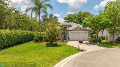 Beautifully updated home on an oversized 14,000 sq. ft. corner on TPC Eagle Trace in Florida - for sale on GolfHomes.com, golf home, golf lot