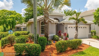 Beautifully updated home on an oversized 14,000 sq. ft. corner on TPC Eagle Trace in Florida - for sale on GolfHomes.com, golf home, golf lot