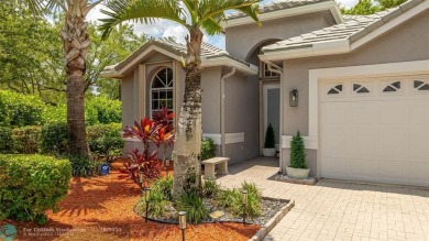 Beautifully updated home on an oversized 14,000 sq. ft. corner on TPC Eagle Trace in Florida - for sale on GolfHomes.com, golf home, golf lot