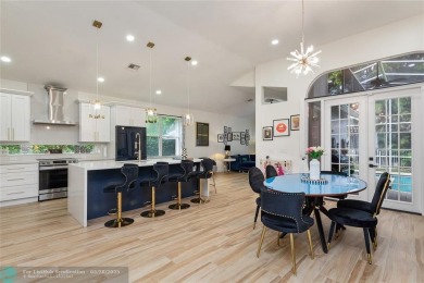 Beautifully updated home on an oversized 14,000 sq. ft. corner on TPC Eagle Trace in Florida - for sale on GolfHomes.com, golf home, golf lot