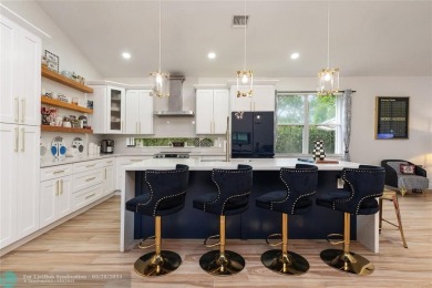 Beautifully updated home on an oversized 14,000 sq. ft. corner on TPC Eagle Trace in Florida - for sale on GolfHomes.com, golf home, golf lot