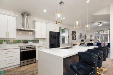 Beautifully updated home on an oversized 14,000 sq. ft. corner on TPC Eagle Trace in Florida - for sale on GolfHomes.com, golf home, golf lot