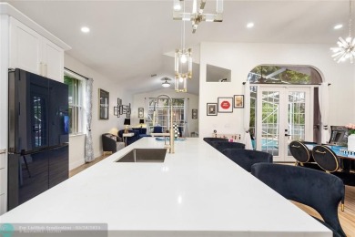 Beautifully updated home on an oversized 14,000 sq. ft. corner on TPC Eagle Trace in Florida - for sale on GolfHomes.com, golf home, golf lot
