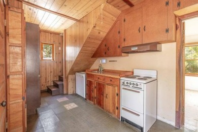 Nestled on a spacious 5,000 square foot lot, this 2-bedroom on Big Bear Mountain Ski and Golf Resort in California - for sale on GolfHomes.com, golf home, golf lot