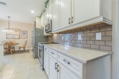 Experience RESORT STYLE Living in the sought after 55+ Community on Tampa Bay Golf and Country Club in Florida - for sale on GolfHomes.com, golf home, golf lot