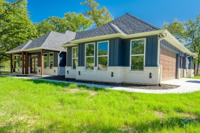 Exquisite brand-new build in the highly sought after Malakoff on Star Harbor Golf Club in Texas - for sale on GolfHomes.com, golf home, golf lot