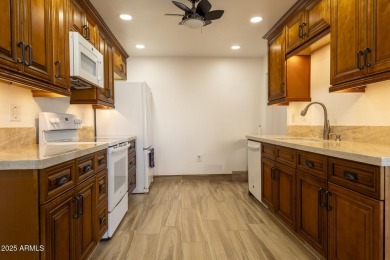 Masterfully Remodeled  Owner-Occupied Elegance in Sun City is on Sun City Lakes West and East in Arizona - for sale on GolfHomes.com, golf home, golf lot