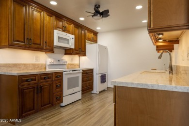 Masterfully Remodeled  Owner-Occupied Elegance in Sun City is on Sun City Lakes West and East in Arizona - for sale on GolfHomes.com, golf home, golf lot