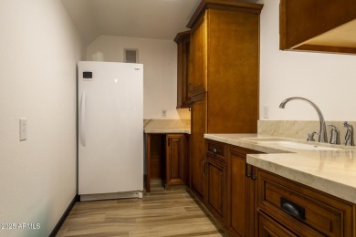 Masterfully Remodeled  Owner-Occupied Elegance in Sun City is on Sun City Lakes West and East in Arizona - for sale on GolfHomes.com, golf home, golf lot