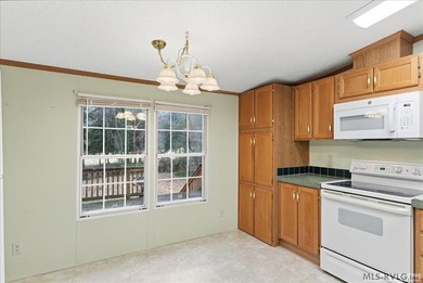 Here it is! 408 Longwood Dr, Bracey, VA -- a value-priced home on Tanglewood Shores Golf Club in Virginia - for sale on GolfHomes.com, golf home, golf lot