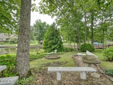 Lakefront Home with Detached Garage and Covered Boat Dock.  Step on Lake Tansi Village Country Club in Tennessee - for sale on GolfHomes.com, golf home, golf lot