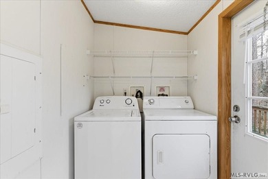 Here it is! 408 Longwood Dr, Bracey, VA -- a value-priced home on Tanglewood Shores Golf Club in Virginia - for sale on GolfHomes.com, golf home, golf lot