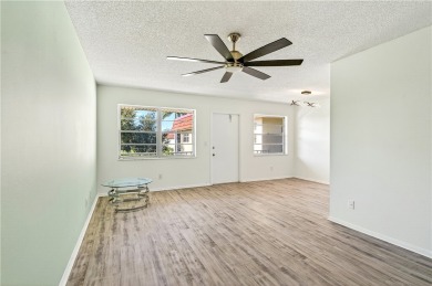Retirement just got an upgrade! Enjoy carefree living in this on The American Golf Club in Florida - for sale on GolfHomes.com, golf home, golf lot