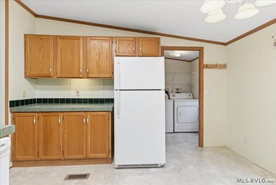 Here it is! 408 Longwood Dr, Bracey, VA -- a value-priced home on Tanglewood Shores Golf Club in Virginia - for sale on GolfHomes.com, golf home, golf lot