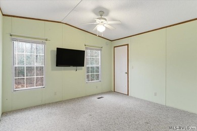 Here it is! 408 Longwood Dr, Bracey, VA -- a value-priced home on Tanglewood Shores Golf Club in Virginia - for sale on GolfHomes.com, golf home, golf lot