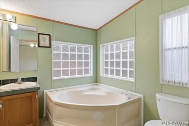 Here it is! 408 Longwood Dr, Bracey, VA -- a value-priced home on Tanglewood Shores Golf Club in Virginia - for sale on GolfHomes.com, golf home, golf lot