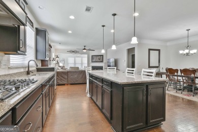 WELCOME TO SUN CITY WHERE YOU CAN ENJOY THE ADULT ACTIVE on Canongate Golf At Sun City Peachtree in Georgia - for sale on GolfHomes.com, golf home, golf lot