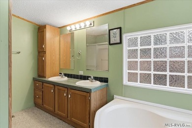 Here it is! 408 Longwood Dr, Bracey, VA -- a value-priced home on Tanglewood Shores Golf Club in Virginia - for sale on GolfHomes.com, golf home, golf lot