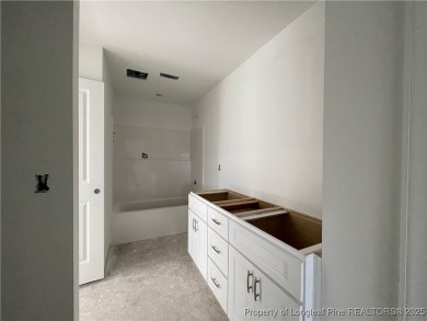 This beautiful semi custom home by Red Rock Builders is waiting on Anderson Creek Golf Club in North Carolina - for sale on GolfHomes.com, golf home, golf lot