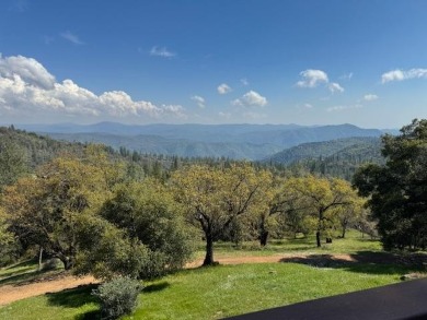 A condo with so much drama! That view is incredible all seasons on Forest Meadows Golf Course in California - for sale on GolfHomes.com, golf home, golf lot