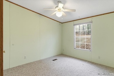 Here it is! 408 Longwood Dr, Bracey, VA -- a value-priced home on Tanglewood Shores Golf Club in Virginia - for sale on GolfHomes.com, golf home, golf lot