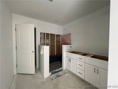 This beautiful semi custom home by Red Rock Builders is waiting on Anderson Creek Golf Club in North Carolina - for sale on GolfHomes.com, golf home, golf lot