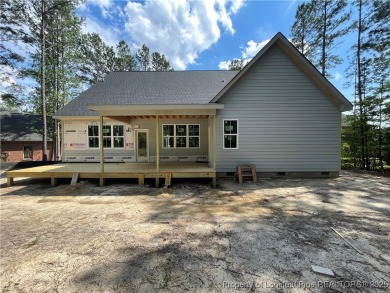 This beautiful semi custom home by Red Rock Builders is waiting on Anderson Creek Golf Club in North Carolina - for sale on GolfHomes.com, golf home, golf lot