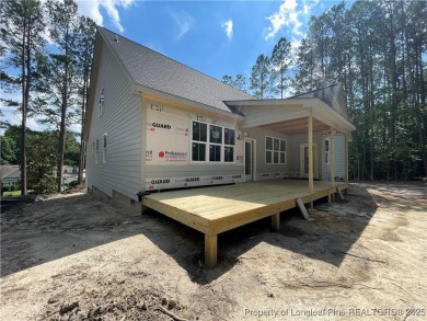 This beautiful semi custom home by Red Rock Builders is waiting on Anderson Creek Golf Club in North Carolina - for sale on GolfHomes.com, golf home, golf lot