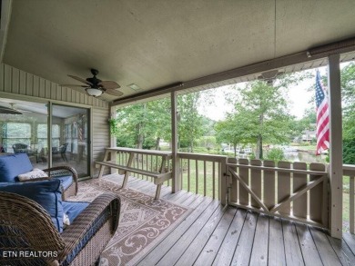 Lakefront Home with Detached Garage and Covered Boat Dock.  Step on Lake Tansi Village Country Club in Tennessee - for sale on GolfHomes.com, golf home, golf lot