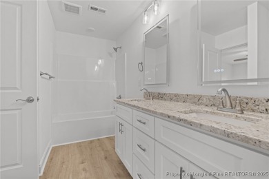 This beautiful semi custom home by Red Rock Builders is waiting on Anderson Creek Golf Club in North Carolina - for sale on GolfHomes.com, golf home, golf lot