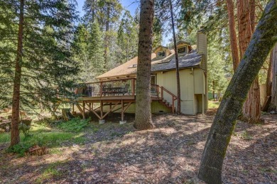 Tucked along the tranquil first fairways of Sequoia Woods Golf on Sequoia Woods Country Club in California - for sale on GolfHomes.com, golf home, golf lot