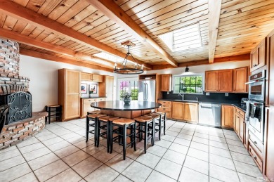 This charming cottage on .38 of an acre sits on an iconic street on Washoe County Golf Club in Nevada - for sale on GolfHomes.com, golf home, golf lot