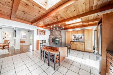 This charming cottage on .38 of an acre sits on an iconic street on Washoe County Golf Club in Nevada - for sale on GolfHomes.com, golf home, golf lot