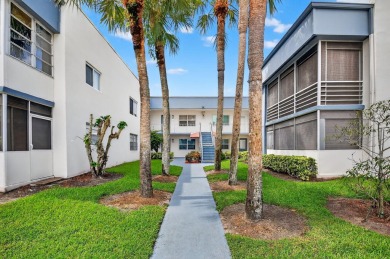 Must see this TOTALLY RENOVATED 2/2 second-floor corner condo on Kings Point Golf -Flanders Way in Florida - for sale on GolfHomes.com, golf home, golf lot