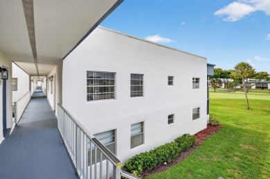 Must see this TOTALLY RENOVATED 2/2 second-floor corner condo on Kings Point Golf -Flanders Way in Florida - for sale on GolfHomes.com, golf home, golf lot