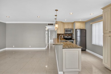 Must see this TOTALLY RENOVATED 2/2 second-floor corner condo on Kings Point Golf -Flanders Way in Florida - for sale on GolfHomes.com, golf home, golf lot