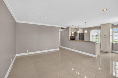 Must see this TOTALLY RENOVATED 2/2 second-floor corner condo on Kings Point Golf -Flanders Way in Florida - for sale on GolfHomes.com, golf home, golf lot