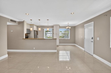 Must see this TOTALLY RENOVATED 2/2 second-floor corner condo on Kings Point Golf -Flanders Way in Florida - for sale on GolfHomes.com, golf home, golf lot