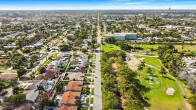 TOTALLY REMODELED 3/2 WITH 1 CAR GARAGE LOCATED RIGHT ACROSS THE on Eco Golf Club in Florida - for sale on GolfHomes.com, golf home, golf lot