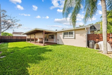 TOTALLY REMODELED 3/2 WITH 1 CAR GARAGE LOCATED RIGHT ACROSS THE on Eco Golf Club in Florida - for sale on GolfHomes.com, golf home, golf lot