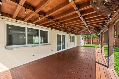 TOTALLY REMODELED 3/2 WITH 1 CAR GARAGE LOCATED RIGHT ACROSS THE on Eco Golf Club in Florida - for sale on GolfHomes.com, golf home, golf lot