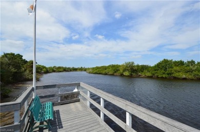 Discover the epitome of Southwest Florida living in Jasmine Bay on West Bay Beach and Golf Club in Florida - for sale on GolfHomes.com, golf home, golf lot