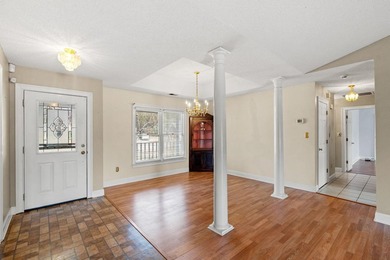 This home is on a gorgeous .47 large lake lot with a stunning on Indigo Creek Golf Club in South Carolina - for sale on GolfHomes.com, golf home, golf lot