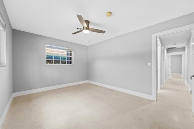 TOTALLY REMODELED 3/2 WITH 1 CAR GARAGE LOCATED RIGHT ACROSS THE on Eco Golf Club in Florida - for sale on GolfHomes.com, golf home, golf lot